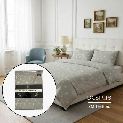 Duvet Cover Set on a bed with ZM Textiles packaging detail, featuring ZM Textiles Belgium printed duvet cover set.