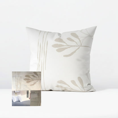 Decorative pillowcase with leaf pattern on a white background, featuring ZM Textiles Belgium printed pillowcase set.