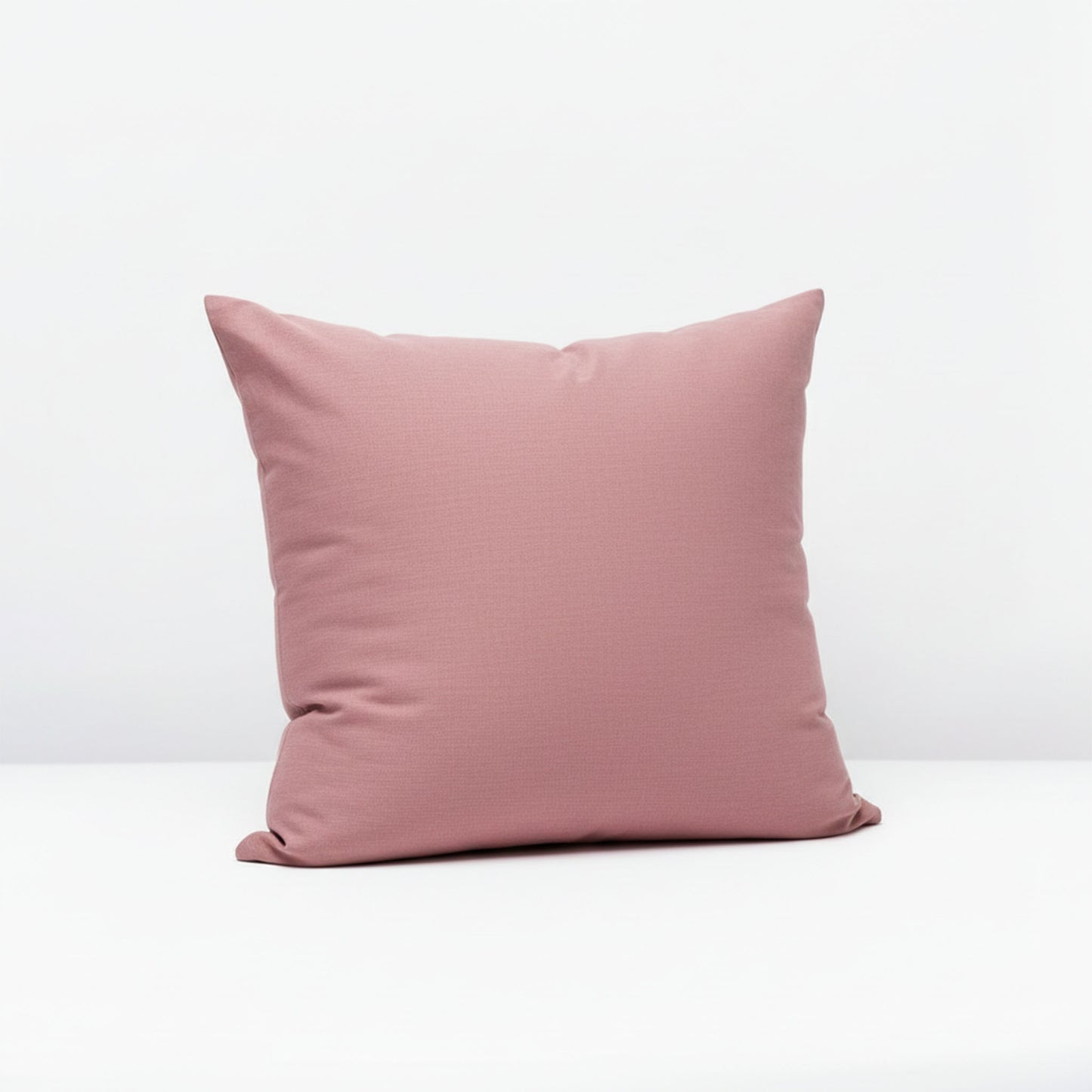 Dusty rose pillowcase on a white background, featuring ZM Textiles Belgium dyed pillowcase set.