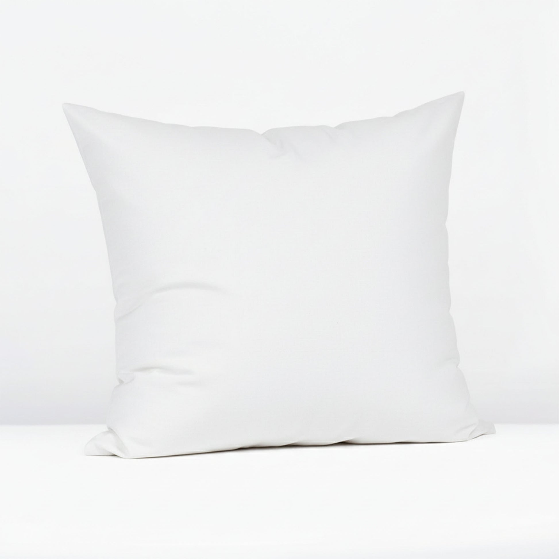 White pillowcase on a white background, featuring ZM Textiles Belgium dyed pillowcase set.